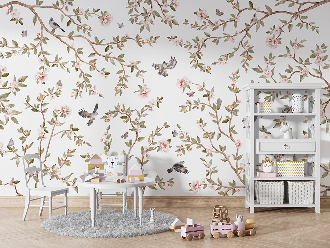 The Summer Roses mural — climbing rose vines with small birds among the leaves, on a pale ground — covering a child's playroom wall